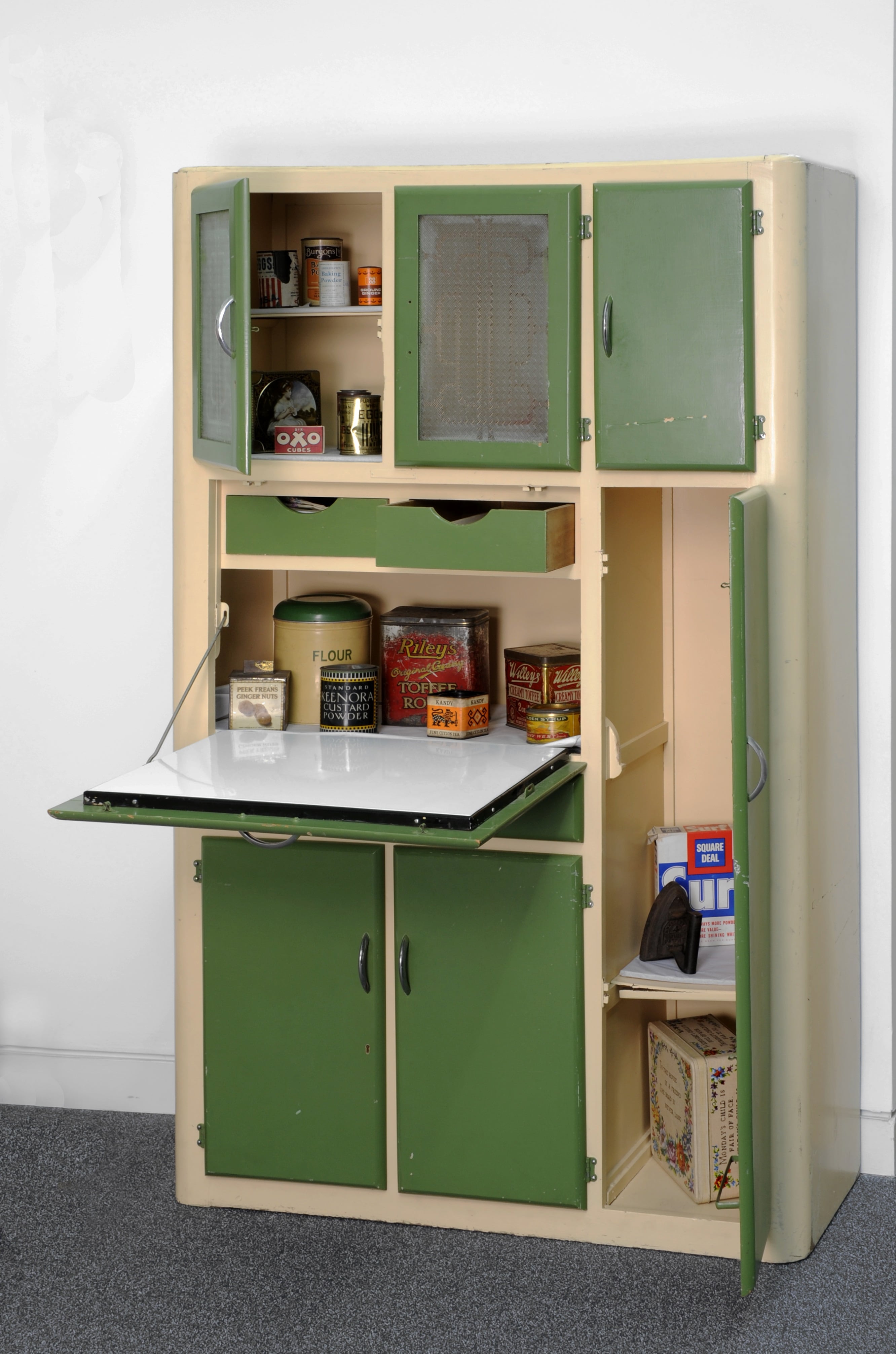 Cupboard with tins of food