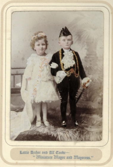 Photograph of children in costume as lady and lord mayor