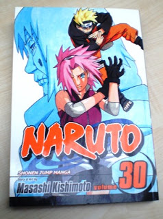 A comic book with the title Naruto 2 figures in anime cartoon style.