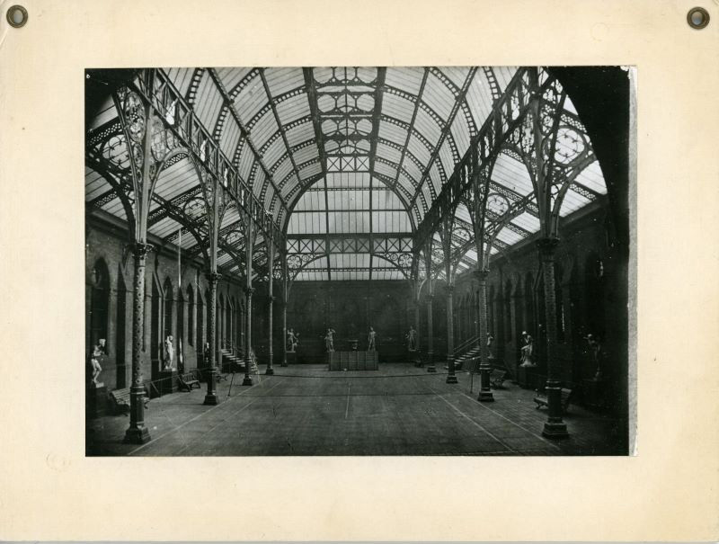 a black and white photograph of a beautiful domed glass ceiling in a massive hall at the infirmary