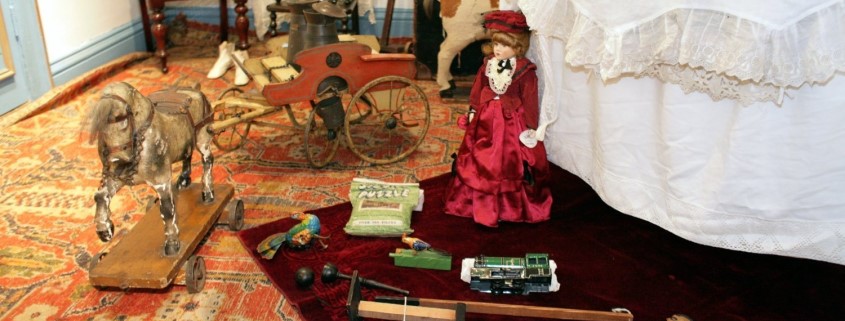 Victorian doll, rocking horse, other toys