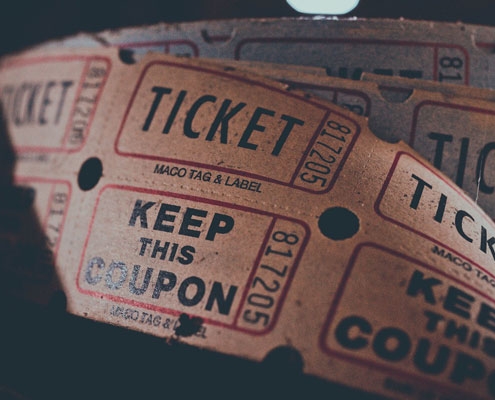 A roll of old fashioned cinema tickets
