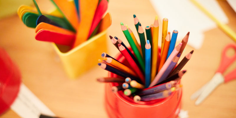 Colouring pencils in a pot