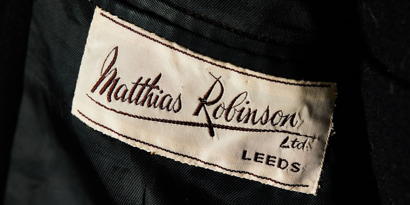 A close up of a label which says Matthias Robinson Leeds