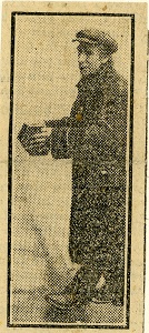 A grainy newspaper photograph of a man in a flat cap