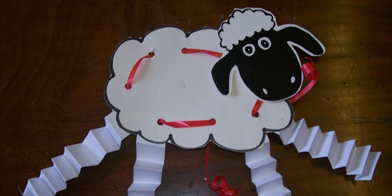 Sewed sheep made of paper and card