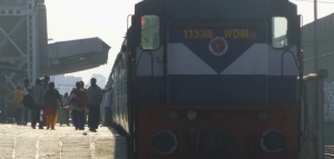 A photograph of a train at a train station.