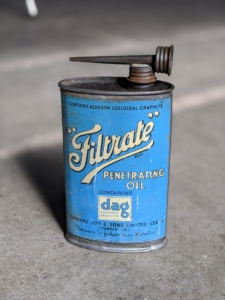 A blue filtrate oil can