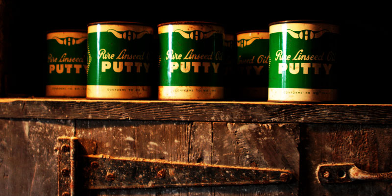 Three cans of putty