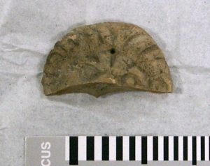 Half of a lion shaped pendant