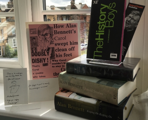 Carol Seagrove's museum window display which features Alan Bennet memor