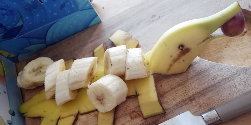 A dolphin carved into a banana