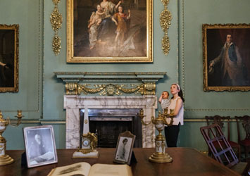 Visitors admire a room in Temple Newsam House