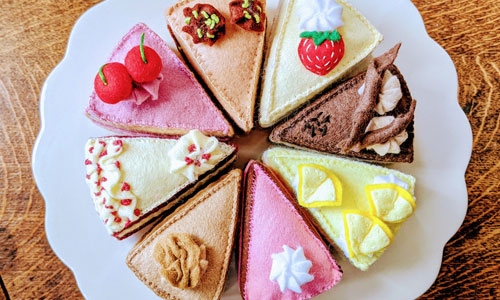 knitted cake slices presented on a white plate