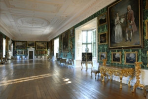 A very large grand Tudor gallery with portraits on the walls