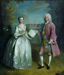 Two rich people dressed in Georgian clothing are posing for a portrait.