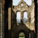 A view from the rear of the church through the large window of Kirkstall Abbey