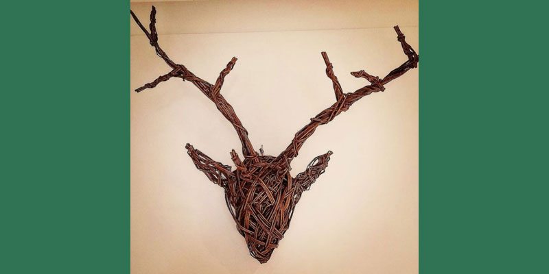 Stag head decoration weaved from willow