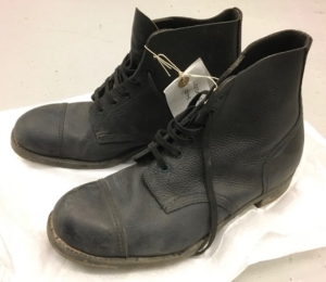 A pair of black lace up boots