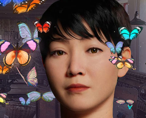 A woman is surrounded by butterflies in an industrial setting