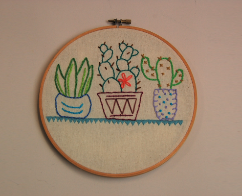 Embroidery hoop with embroidered cactuses