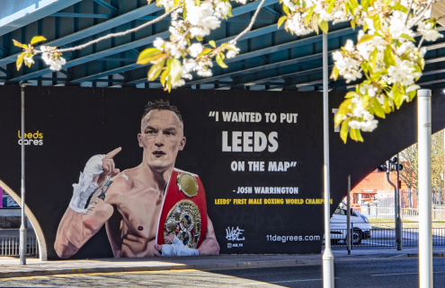 Street art of Josh Warrington with text reading "I wanted to put Leeds on the map" - Josh Warrington Leeds's first male boxing world champion