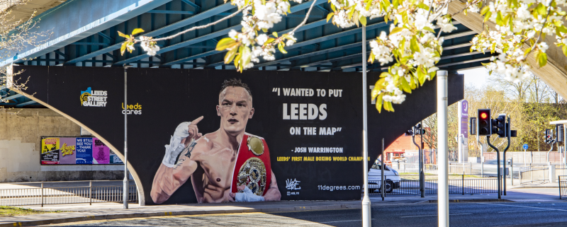 Street art of Josh Warrington with text reading "I wanted to put Leeds on the map" - Josh Warrington Leeds's first male boxing world champion