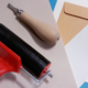 Paint roller, paper, crafting materials