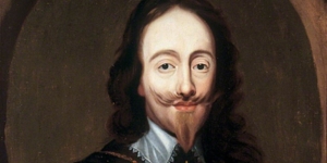 painting of king charles I, a man with long wavy hair and a pointed beard and moustache